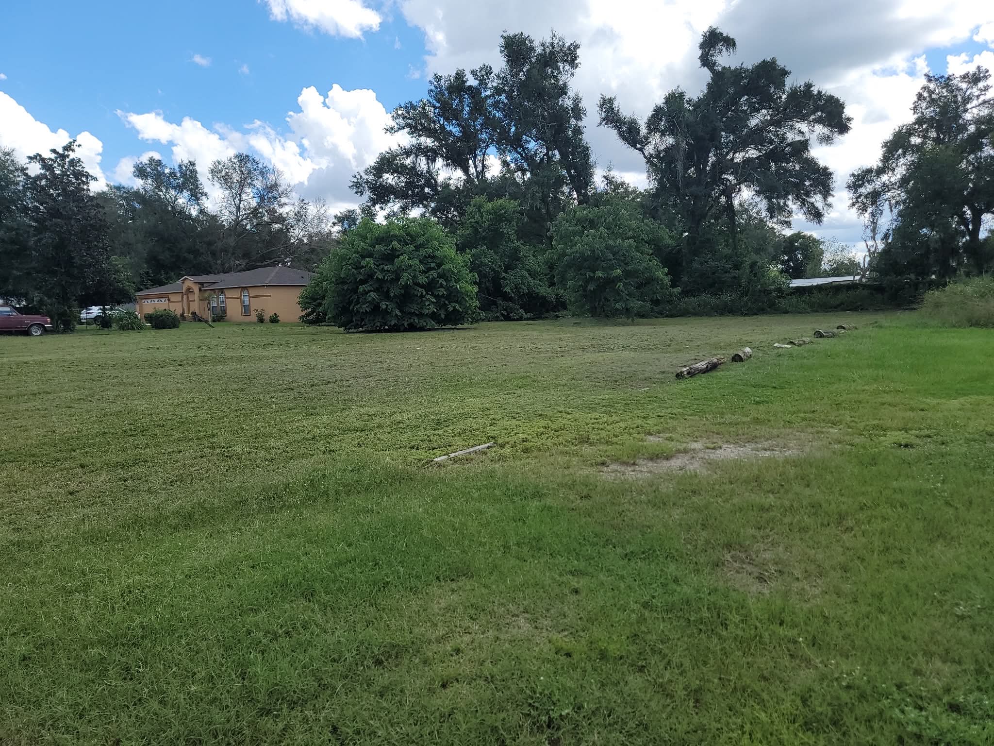 Large neatly mowed grassy property